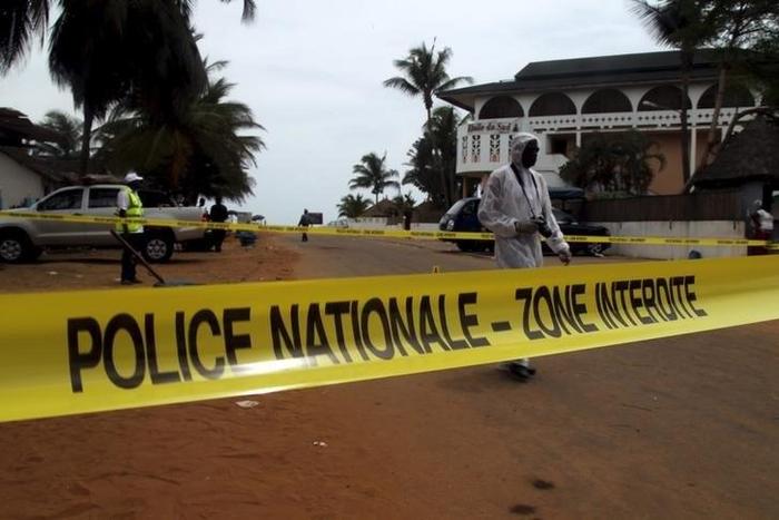A police cordon is seen while Ivorian police prepare to inspect the area of the hotel Etoile du Sud following an attack by gunmen from al Qaeda's North African branch, in Grand Bassam, Ivory Coast, March 14, 2016.