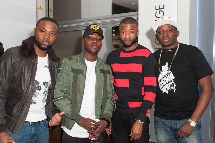 Reekado Banks with fans at Gatwick Airport, London
