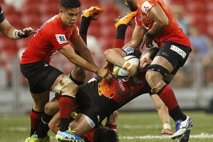 Rugby Union - Sunwolves vs Bulls - 2016 Super Rugby - National Stadium, Singapore - 26/3/16 - Sunwolves' Yu Tamura tackles Bulls' Jesse Kriel