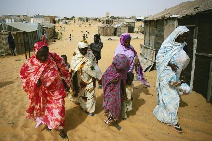 Mauritanians ex-slaves walk in a suburb outside Mauritania's capital Nouakchott, file. REUTERS/Rafael Marchante