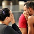 Mourners comfort themselves following Orlando shooting which left 50 people dead.