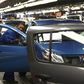 A worker inspects cars at Nissan's manufacturing plant in Rosslyn, outside Pretoria, file.