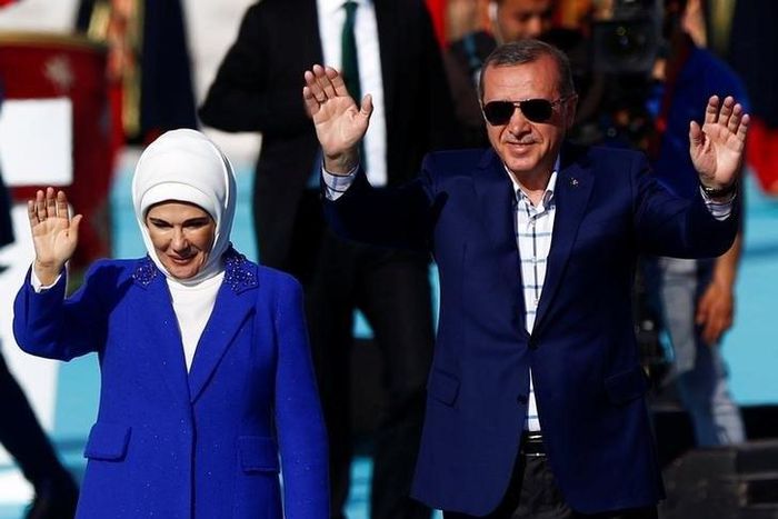 Turkish President Tayyip Erdogan, accompanied by his wife Emine Erdogan, greets supporters during a rally to mark the 563rd anniversary of the conquest of the city by Ottoman Turks, in Istanbul, Turkey, May 29, 2016.