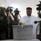 Niger's incumbent President Mahamadou Issoufou votes at a polling station during the country's presidential and legislative elections in Niamey, Niger, February 21, 2016. REUTERS/Joe Penney