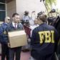 FBI agents bring out boxes after an operation inside the CONCACAF (Confederation of North, Central America and Caribbean Association Football) offices in Miami Beach, Florida May 27, 2015.  REUTERS/Javier Galeano