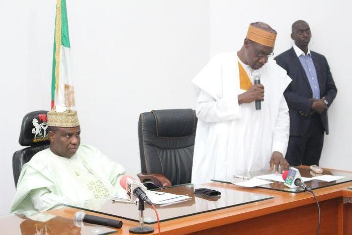 Chairman of Sokoto State Committee for the Revitalisation of Agriculture, Alhaji Chiso Abdullahi Dattijo presenting his remarks while Governor Aminu Waziri Tambuwal listens.