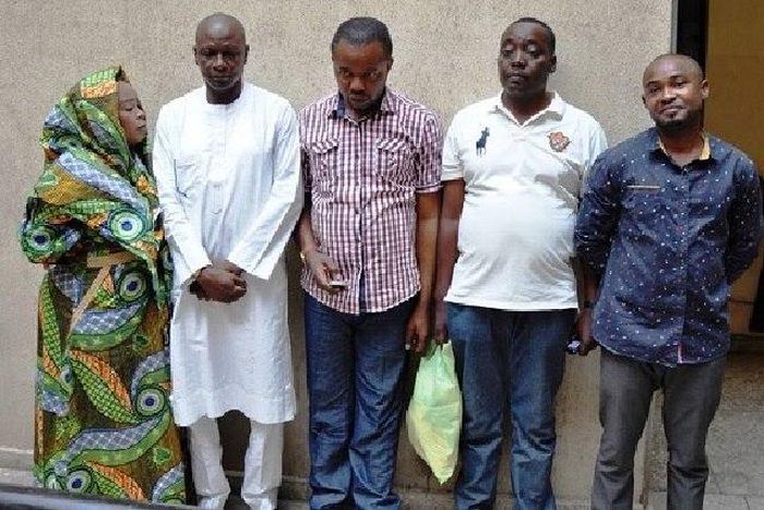 The fraudsters posing for the press