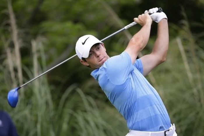 Rory McIlroy of Northern Ireland plays against Jason Day of Australia during round six of the World Golf Championship-Dell Match Play at the Austin Country Club.