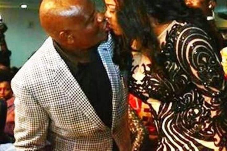 Rivers State Governor, Nyesom Wike and wife, Eberechi kissing at AMAA 2016