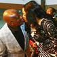 Rivers State Governor, Nyesom Wike and wife, Eberechi kissing at AMAA 2016