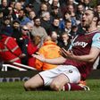 Andy Carroll celebrates scoring the second goal for West Ham against Arsenal at Upton Park on 9/4/16
