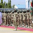 Nigerian President Muhammadu Buhari inspects a guard of honour during his visit to Nigerian troops in Yola, Adamawa, Nigeria November 13, 2015