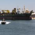 A cargo ship is seen crossing through the New Suez Canal, Ismailia, Egypt, July 29, 2015. (This picture is for illustrative purposes.)