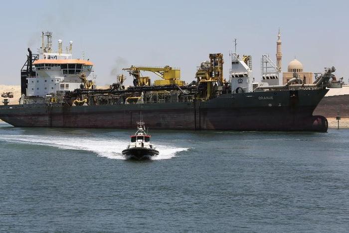 A cargo ship is seen crossing through the New Suez Canal, Ismailia, Egypt, July 29, 2015. (This picture is for illustrative purposes.)