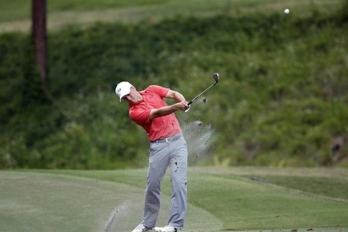 Jordan Spieth plays his approach shot on the 6th hole during the second round of the 2016 Players Championship golf tournament at TPC Sawgrass - Stadium Course.