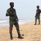 Soldiers stand guard on the beach following an attack by gunmen from al Qaeda's North African branch, in Grand Bassam, Ivory Coast, March 14, 2016. REUTERS/Luc Gnago
