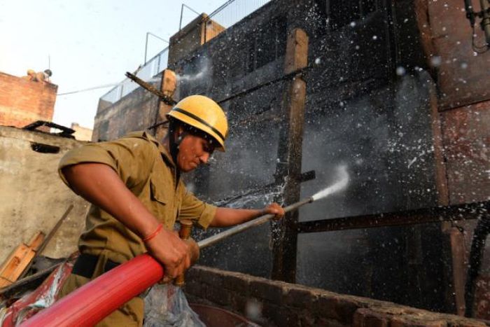 Fire fighters at the scene of an inferno attack