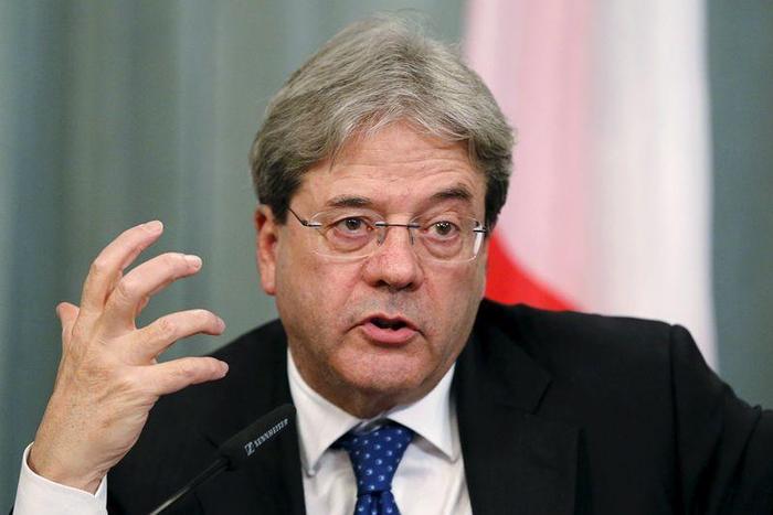 Italian Foreign Minister Paolo Gentiloni speaks during a joint news conference with his Russian counterpart Sergei Lavrov following their meeting in Moscow, Russia, March 25, 2016.