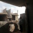 A man stands in his house which was destroyed during clashes between military forces loyal to Libya's eastern government and the Shura Council of Libyan Revolutionaries. March 12, 2016. REUTERS/Esam Omran Al-Fetori