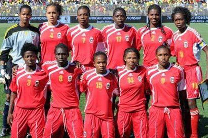 Equatorial Guinea's women's football team. Captain Genoveva Anonma is on the right of the back row; striker Salimata Simpore is second from the left on the front row.