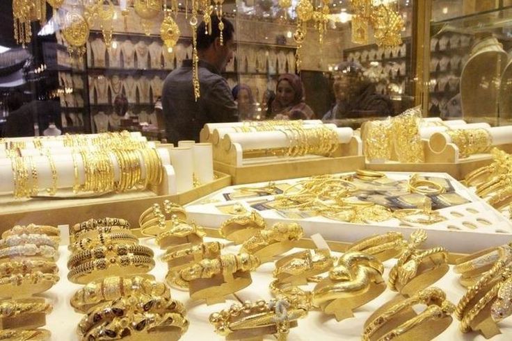 Gold jewellery is seen displayed for sale at a shop in a gold market in Basra, southeast of Baghdad February 14, 2015.