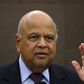 South African Finance Minister Pravin Gordhan reacts during a media briefing in Sandton near Johannesburg March 14, 2016. Picture taken March 14, 2016.