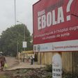 A billboard with a message about Ebola is seen on a street in Conakry, Guinea in this October 26, 2014 file photo. REUTERS/Michelle Nichols
