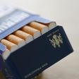 Pall Mall cigarettes are seen after the manufacturing process in the British American Tobacco Cigarette Factory (BAT) in Bayreuth, southern Germany, April 30, 2014. REUTERS/Michaela Rehle