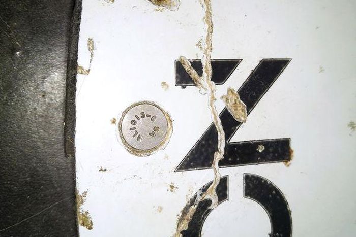 A photograph of debris thought to be from the missing Malaysian Airlines MH370 plane is seen in this handout photo taken on February 28, 2016