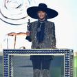 Beyonce receives the 2016 CFDA Fashion Icon Award in a shimmering Givenchy suit and hat