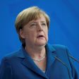 After attacks, Merkel cuts short holiday to face refugee policy storm