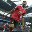 Marcus Rashford celebrates after scoring against Manchester City on Sunday, March 20