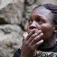 A woman reacts as rescue workers search for residents feared trapped in the rubble of a six-storey building that collapsed after days of heavy rain, in Nairobi, Kenya April 30, 2016.