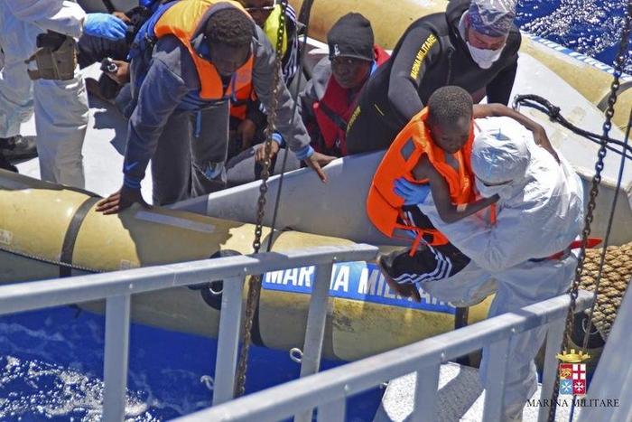 Migrants are seen during a rescue operation by Italian Navy vessels off the coast of Sicily in this April 11, 2016 handout picture provided by Marina Militare.
