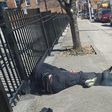 Baltimore teen stops to pray for homeless man