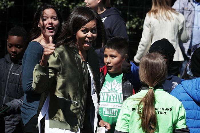 Michelle Obama at the white house kitchen garden planting