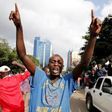 Kenyan opposition Coalition of Reform and Democracy (CORD) supporters protest at the premises hosting the headquarters of Independent Electoral and Boundaries Commission (IEBC) to demand the disbandment of the electoral body ahead of next year"s electi...