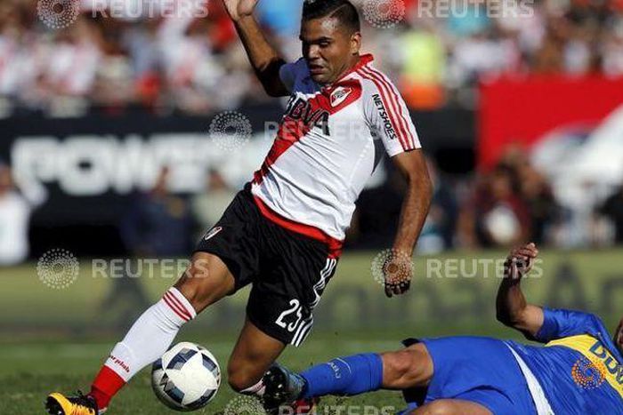 Sevilla sign Argentina defender Mercado on three-year deal