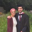 University graduate shares throwback photo of himself and his mom on her graduation 20 years ago.