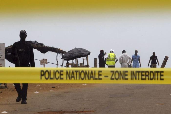 A police cordon is seen while Ivorian police prepare to inspect the area of the hotel Etoile du Sud following an attack by gunmen from al Qaeda's North African branch, in Grand Bassam, Ivory Coast, March 14, 2016.