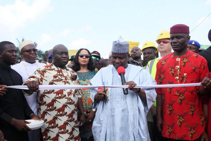 Governor Aminu Waziri of Sokoto State cutting the tape to formally flag off the Umuocham-Umule-Umuehilegbu road built by Abia State government in Aba .