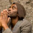 Praying black man