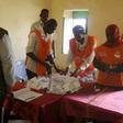 Observers watch as officials count ballots after a referendum vote in El Fasher in North Darfur April 14, 2016. REUTERS/Mohamed Nureldin Abdallah