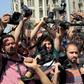 Egyptian journalists hold up their cameras outside the Egyptian Press Syndicate in downtown Cairo, Egypt April 28, 2016, during a protest against the interior minister following the arrest of colleagues for covering anti-government demonstrations.