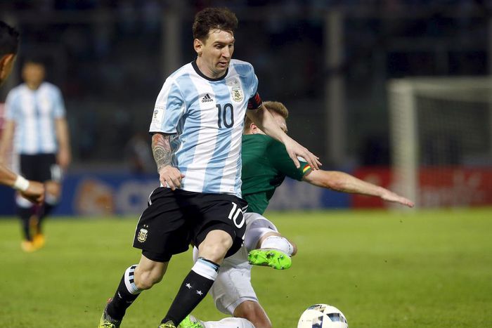Argentina's Lionel Messi in action against Bolivia's Alejandro Bracamonte
