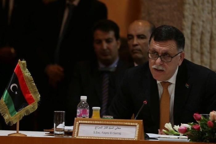 Libyan Prime Minister-designate Fayez Seraj speaks during the 8th ministerial meeting of Libya's neighbouring countries in Tunis, Tunisia March 22, 2016.