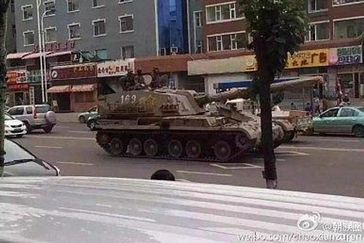 China denies reports of massing troops at North Korea border