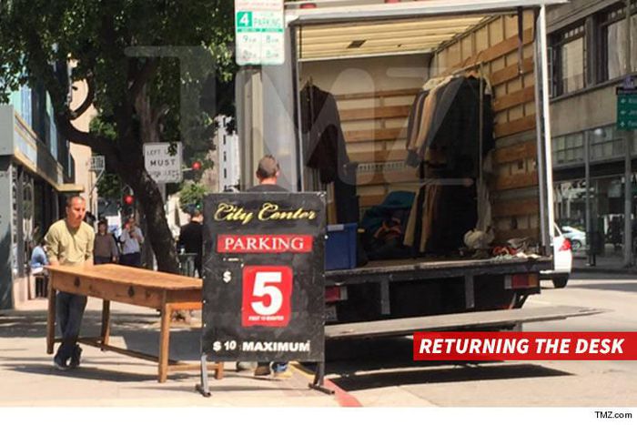 Johnny Depp moving truck parked outside home