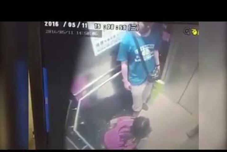 Woman caught on camera peeing in an elevator
