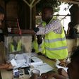 A voter waits to cast her vote at a polling station during presidential elections on July 17, 2016 in Sao Tome, capital of Sao Tome and Principe 